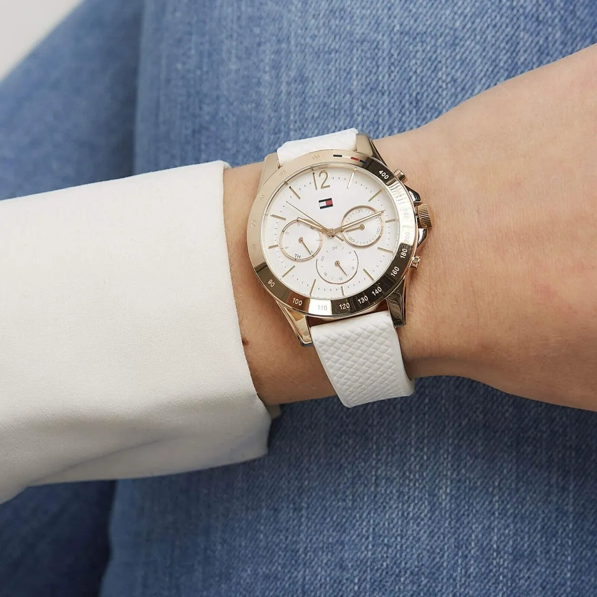Tommy Hilfiger Haven chronograph watch on-wrist with rose gold case and white strap