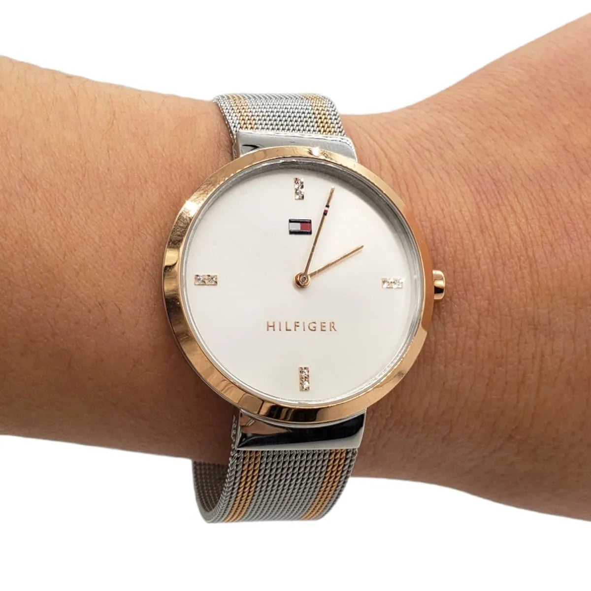 Tommy Hilfiger Liberty watch worn on wrist with white dial and crystal accents visible