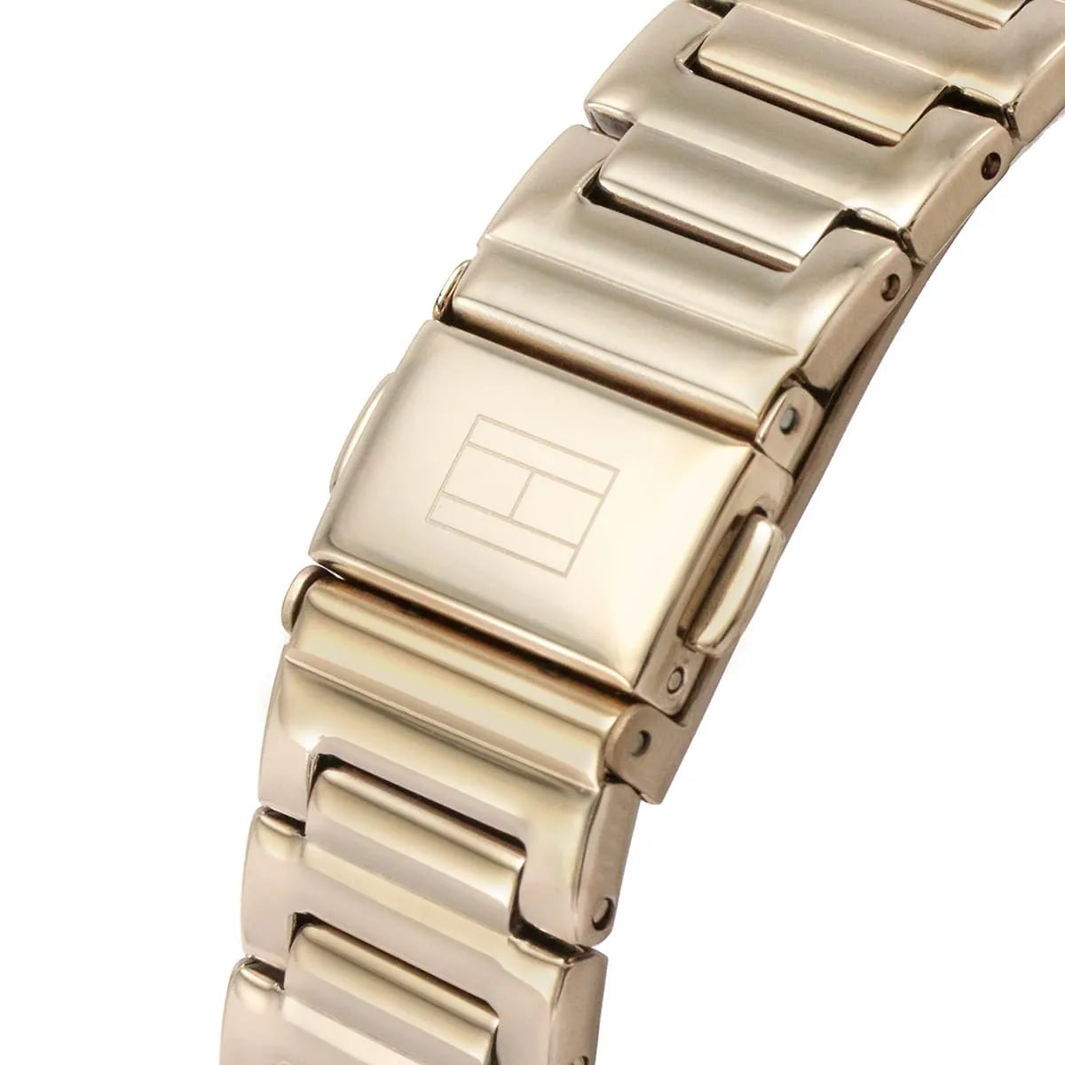 Close-up of Tommy Hilfiger Libby rose gold metal bracelet links and clasp