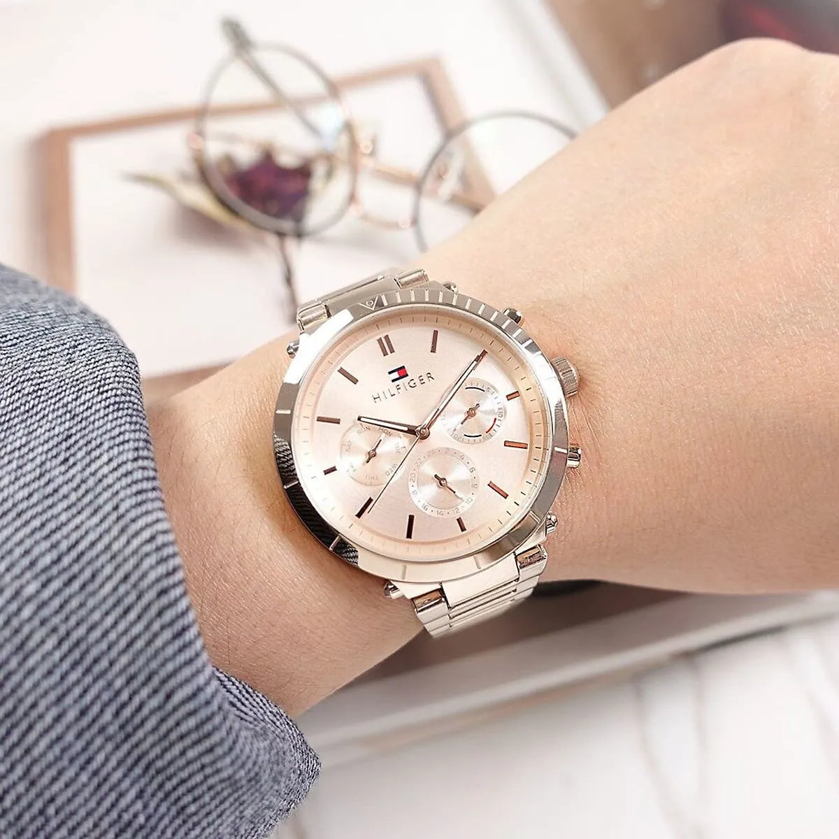 Tommy Hilfiger Libby rose gold chronograph watch worn on wrist with lifestyle styling
