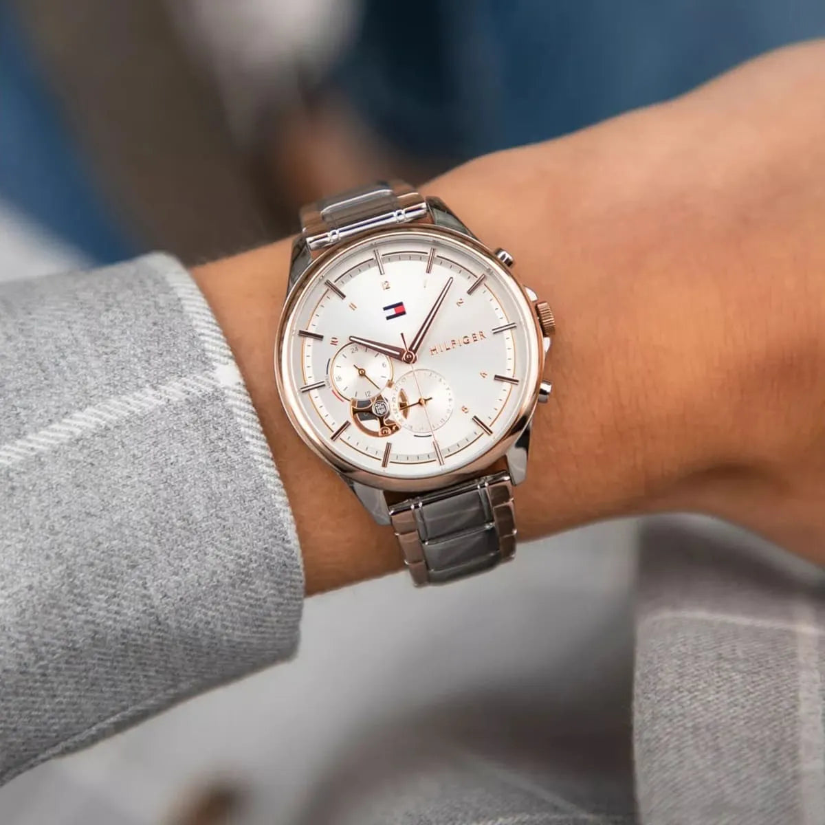 Tommy Hilfiger Quinn women's watch on wrist displaying chronograph subdials and rose gold accents