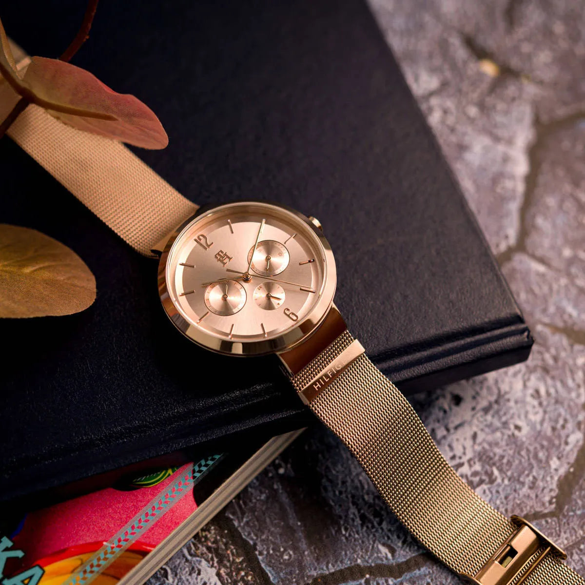 Tommy Hilfiger Lidia chronograph watch worn on wrist with rose gold mesh strap