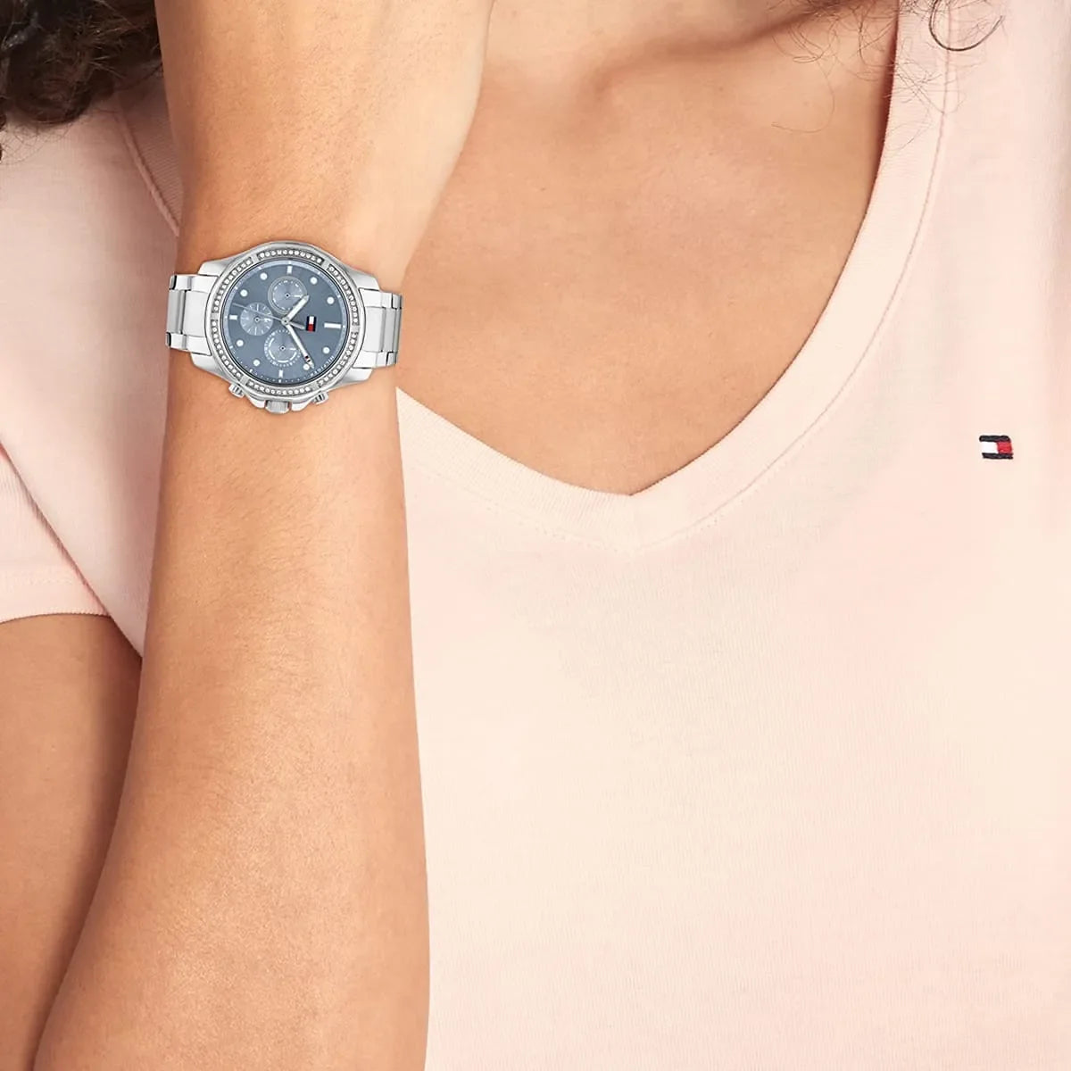 Tommy Hilfiger Libby women's watch worn on wrist with blue dial and crystal bezel