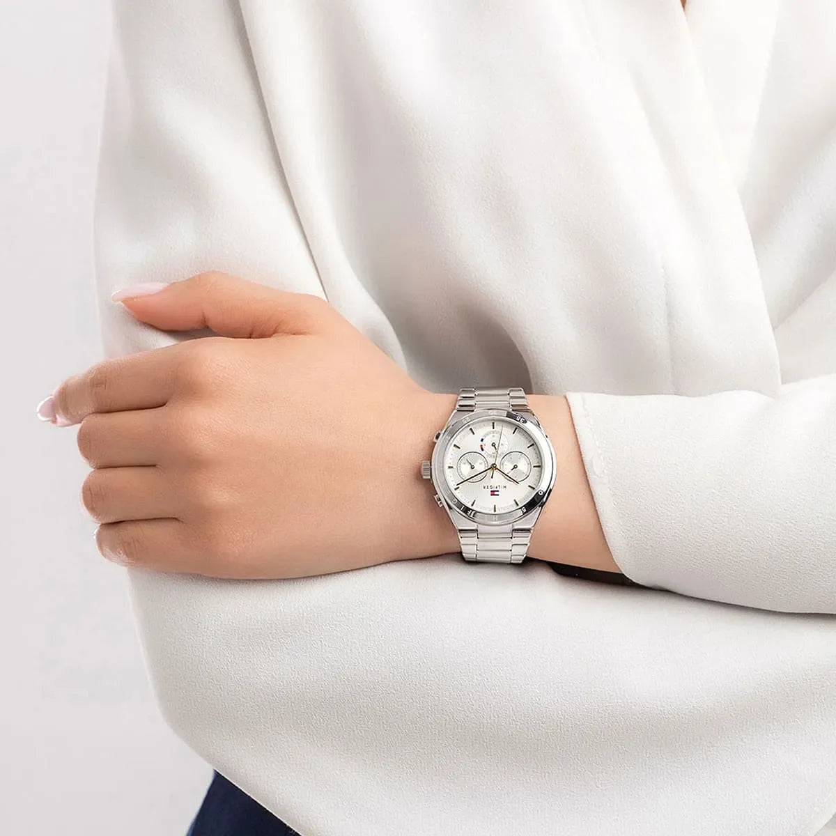 Tommy Hilfiger Libby women's watch worn on wrist over white sleeve