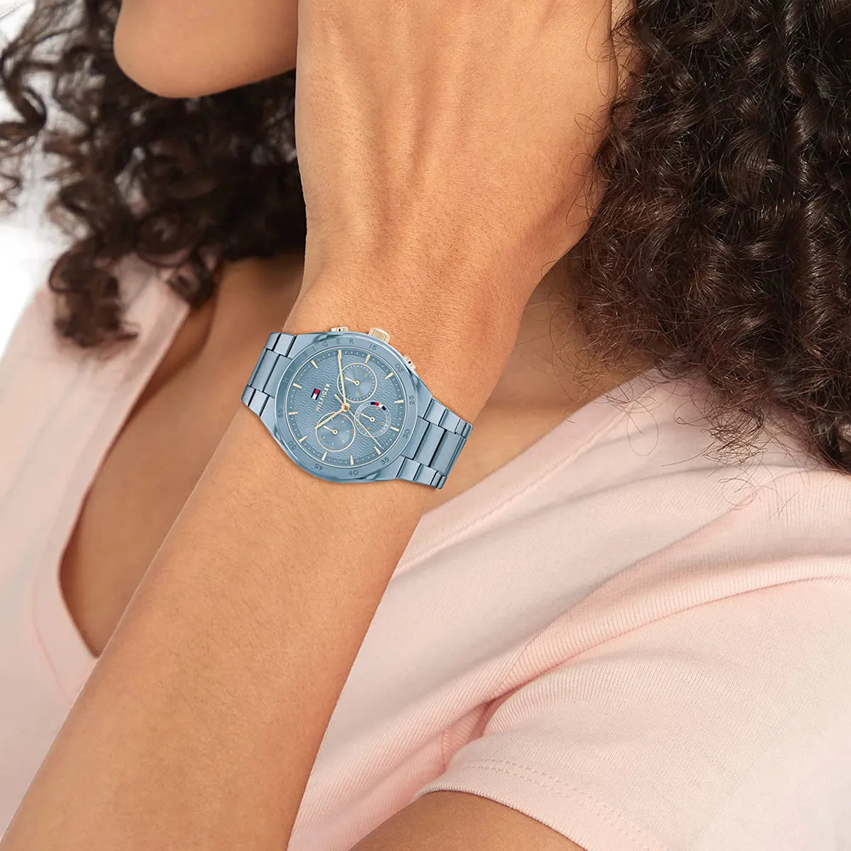 Tommy Hilfiger Carrie ladies watch on wrist showing light blue chronograph dial