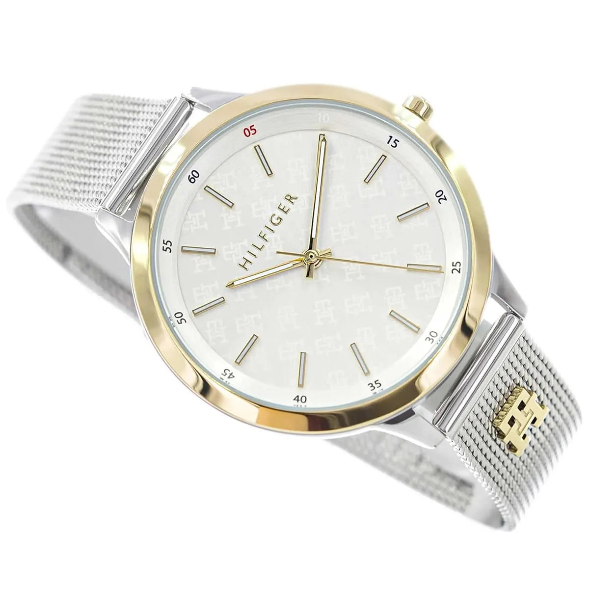 Tommy Hilfiger Iris watch side view with gold bezel and silver mesh band