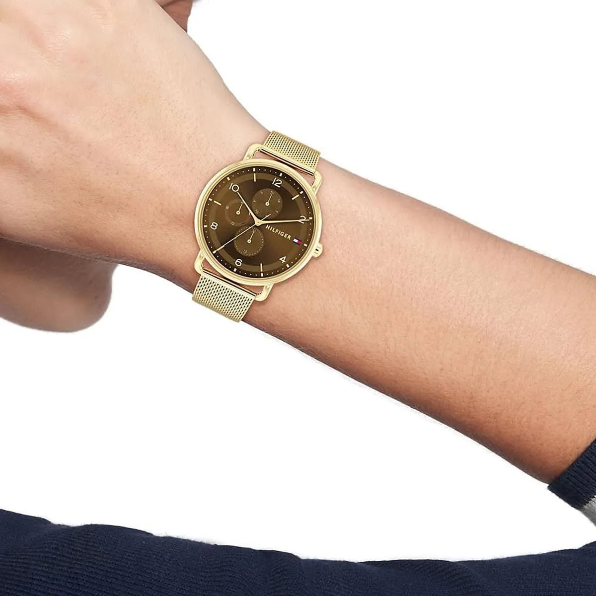 Tommy Hilfiger Lily women's watch on wrist showing brown chronograph dial