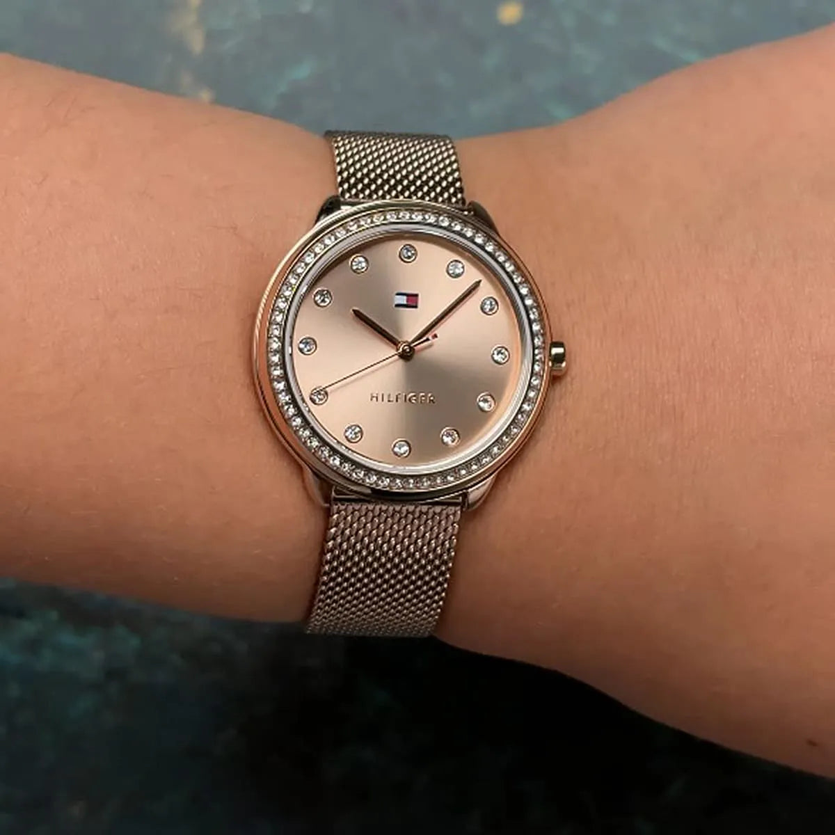 Tommy Hilfiger Demi rose gold watch worn on wrist with mesh strap