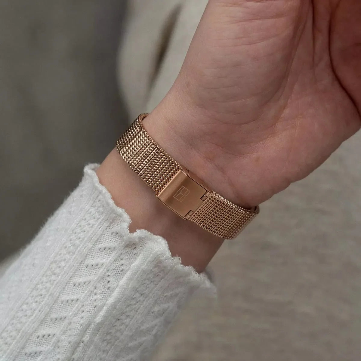 Tommy Hilfiger Pippa rose gold watch worn on wrist detail of mesh bracelet