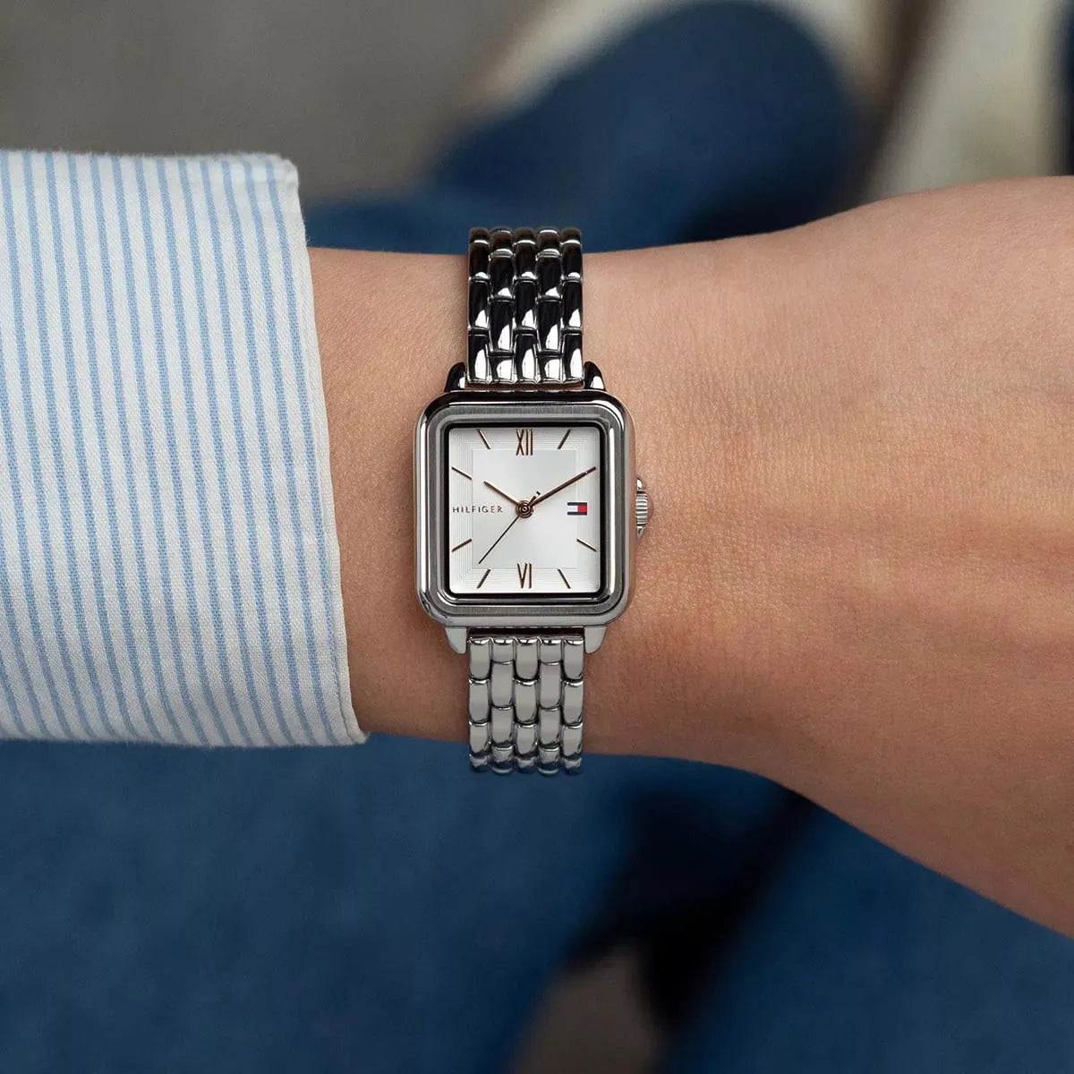 Tommy Hilfiger Mia watch worn on wrist with striped shirt