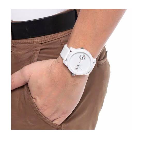 Tommy Hilfiger white men's watch worn on wrist with white silicone strap