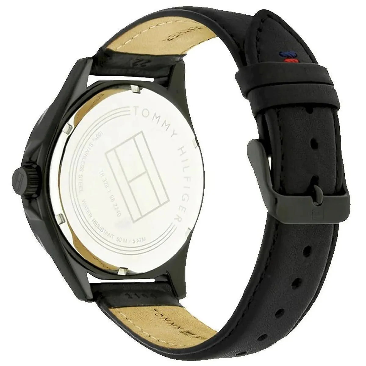 Tommy Hilfiger watch case back showing engraved branding and tan leather strap lining