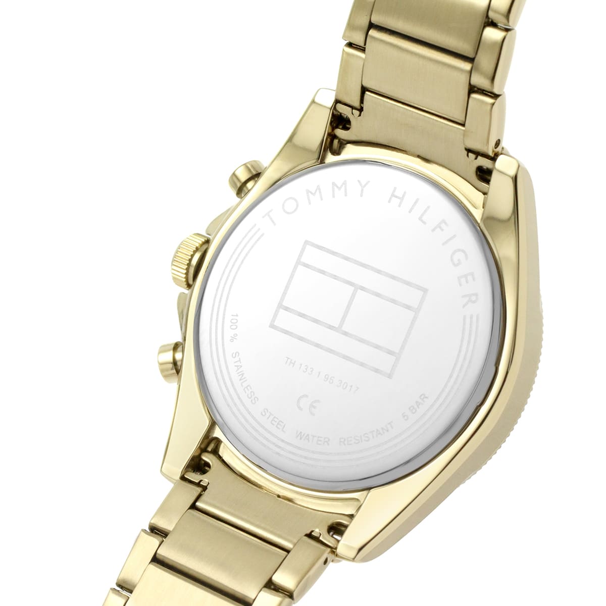 Tommy Hilfiger watch caseback detail showing engraved branding and specifications