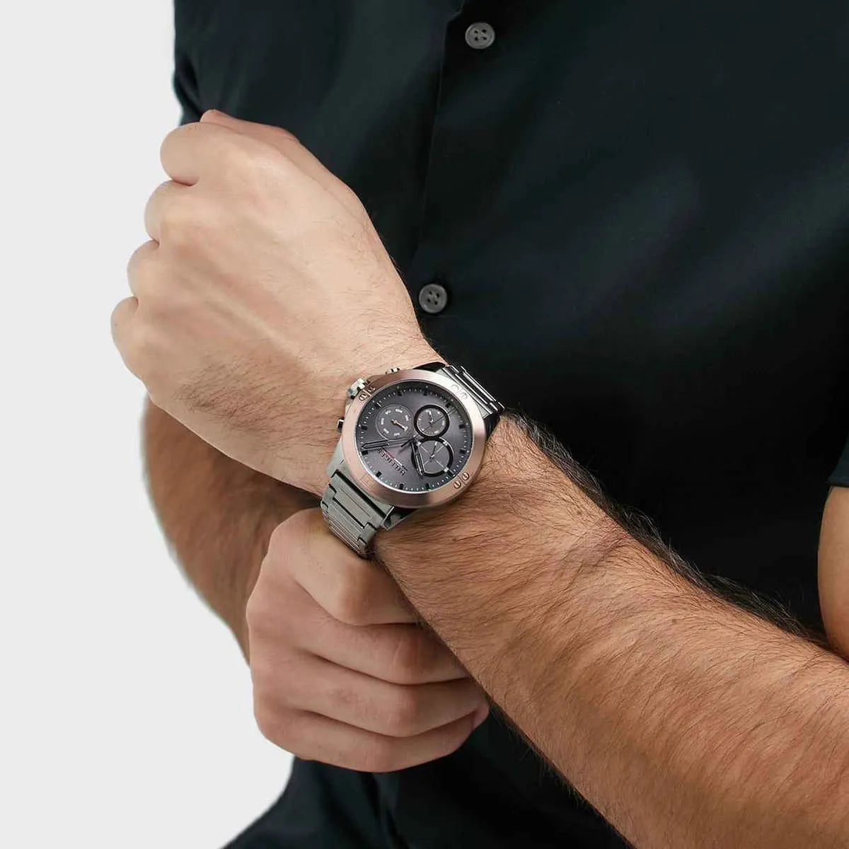 Tommy Hilfiger 1791892 men's watch worn on wrist with black shirt