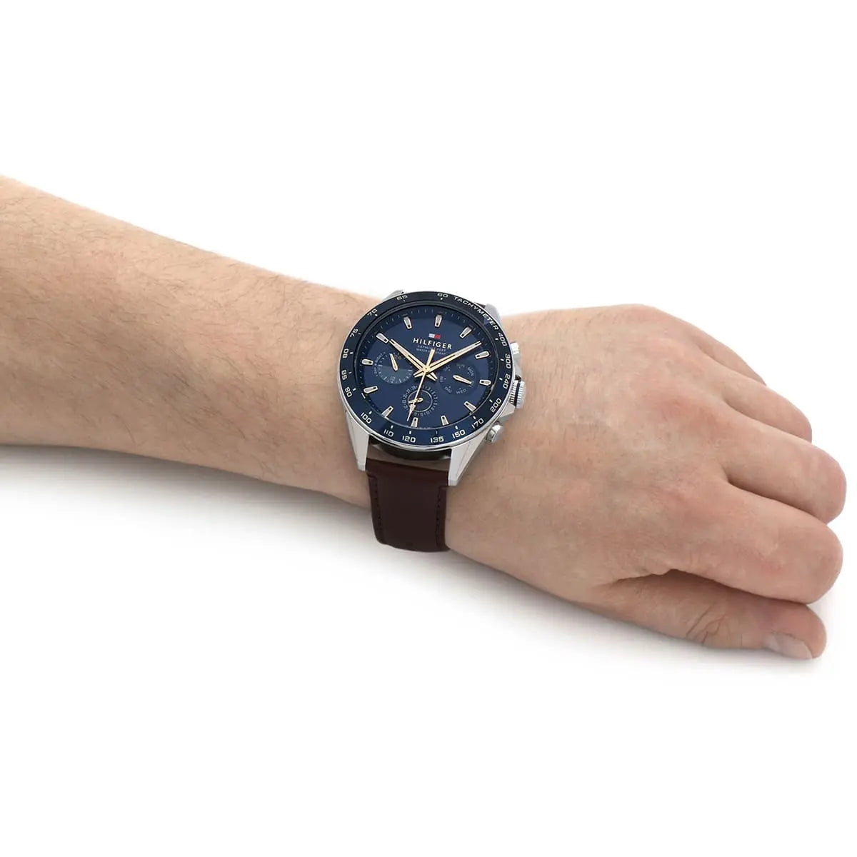 Tommy Hilfiger Owen chronograph watch worn on wrist with brown leather strap
