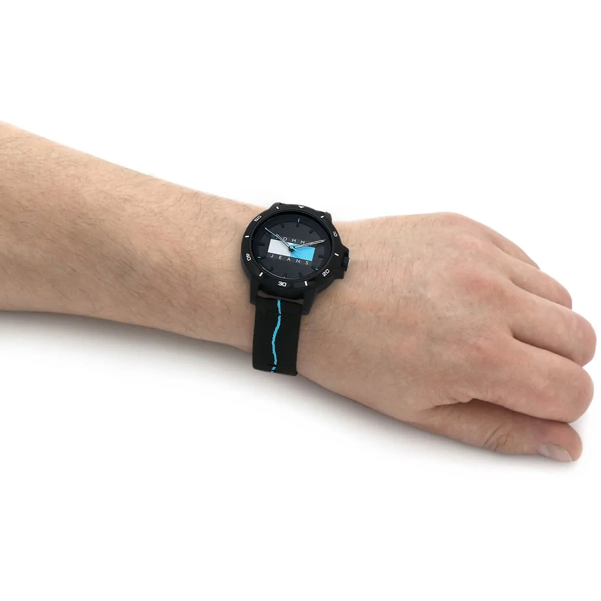 Tommy Hilfiger black men's watch worn on wrist with blue striped textile strap