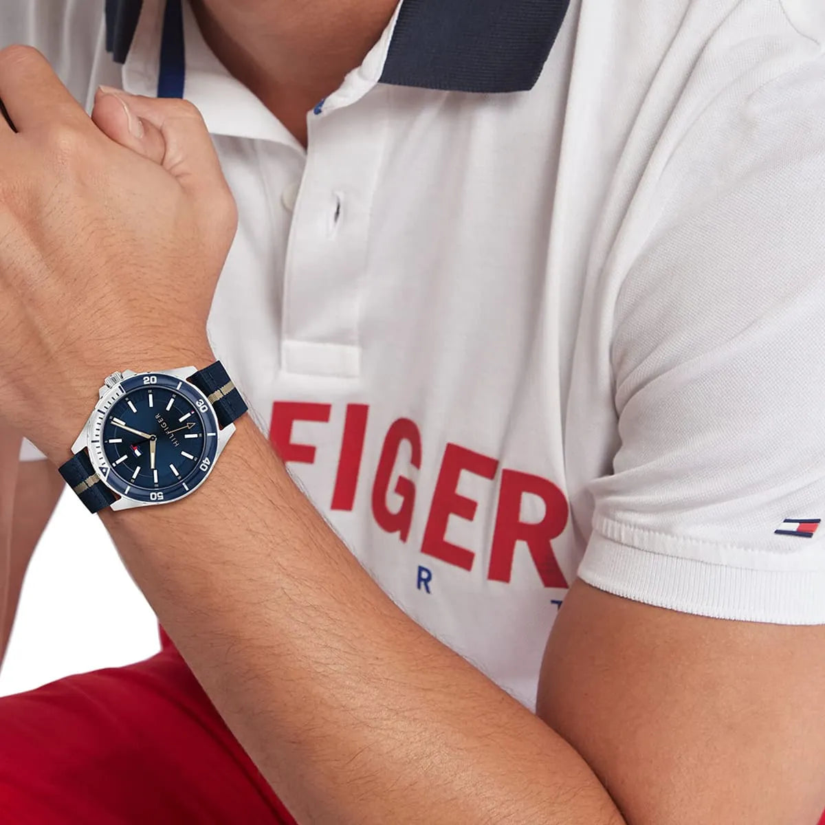 Tommy Hilfiger Logan watch on wrist styled with Tommy Hilfiger polo shirt