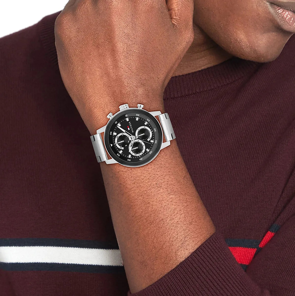 Tommy Hilfiger Rocky chronograph watch worn on wrist with black dial and stainless steel bracelet