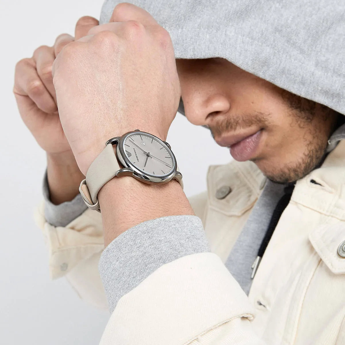 AR11116 Emporio Armani men's watch on wrist showing gray dial and taupe strap
