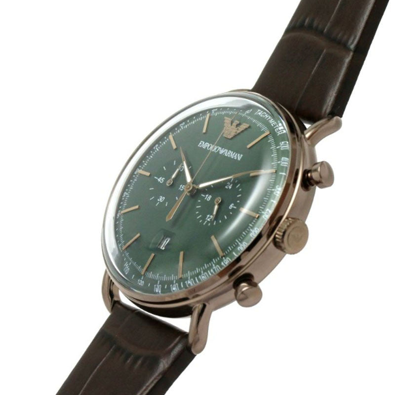 Emporio Armani Mario chronograph watch on wrist with green dial and brown strap