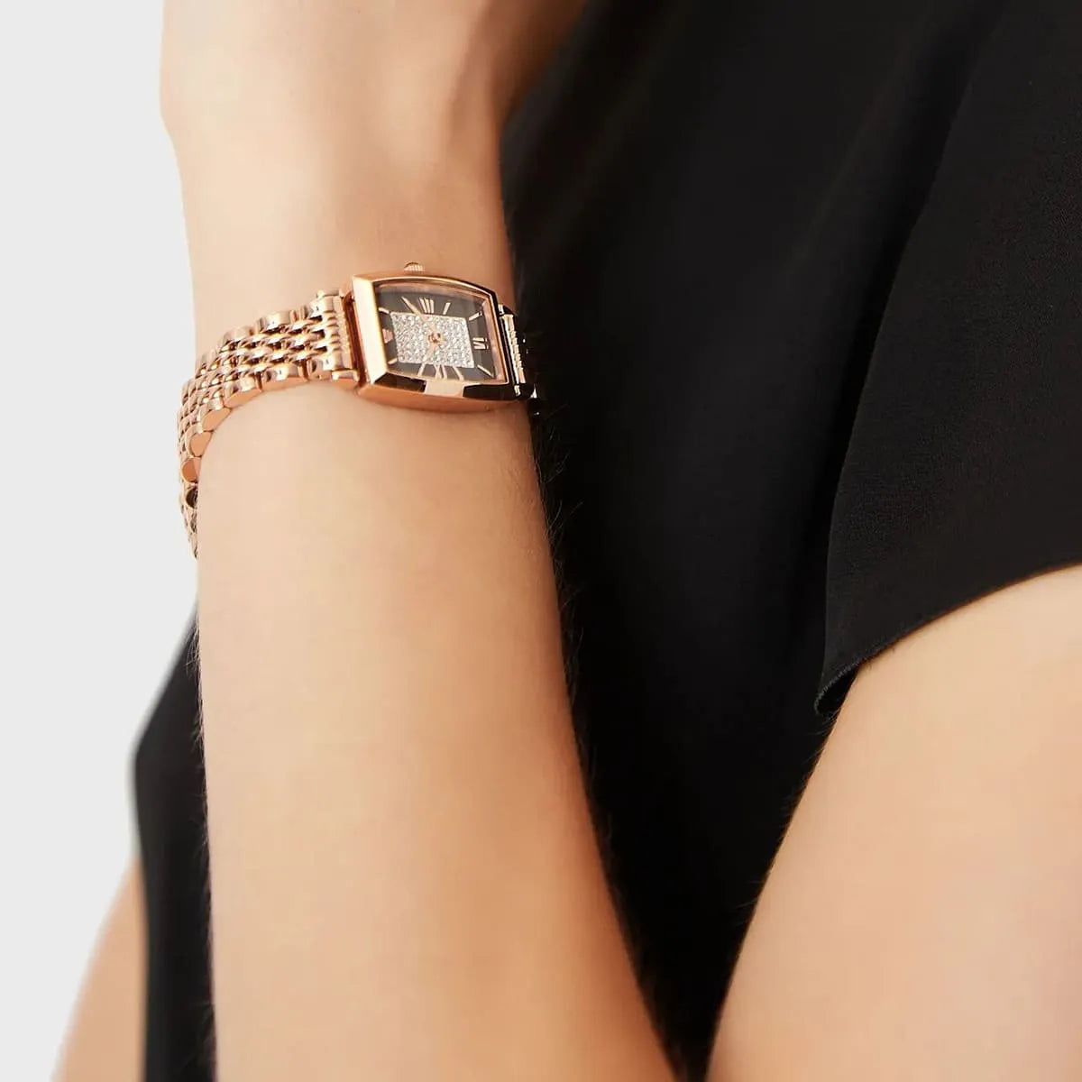 AR11407 Emporio Armani on wrist showing square case with brown dial and rose gold bracelet