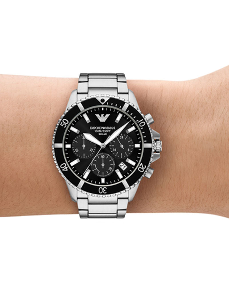 Emporio Armani Gianni T-Bar AR11739 worn on wrist showing black dial and steel bracelet