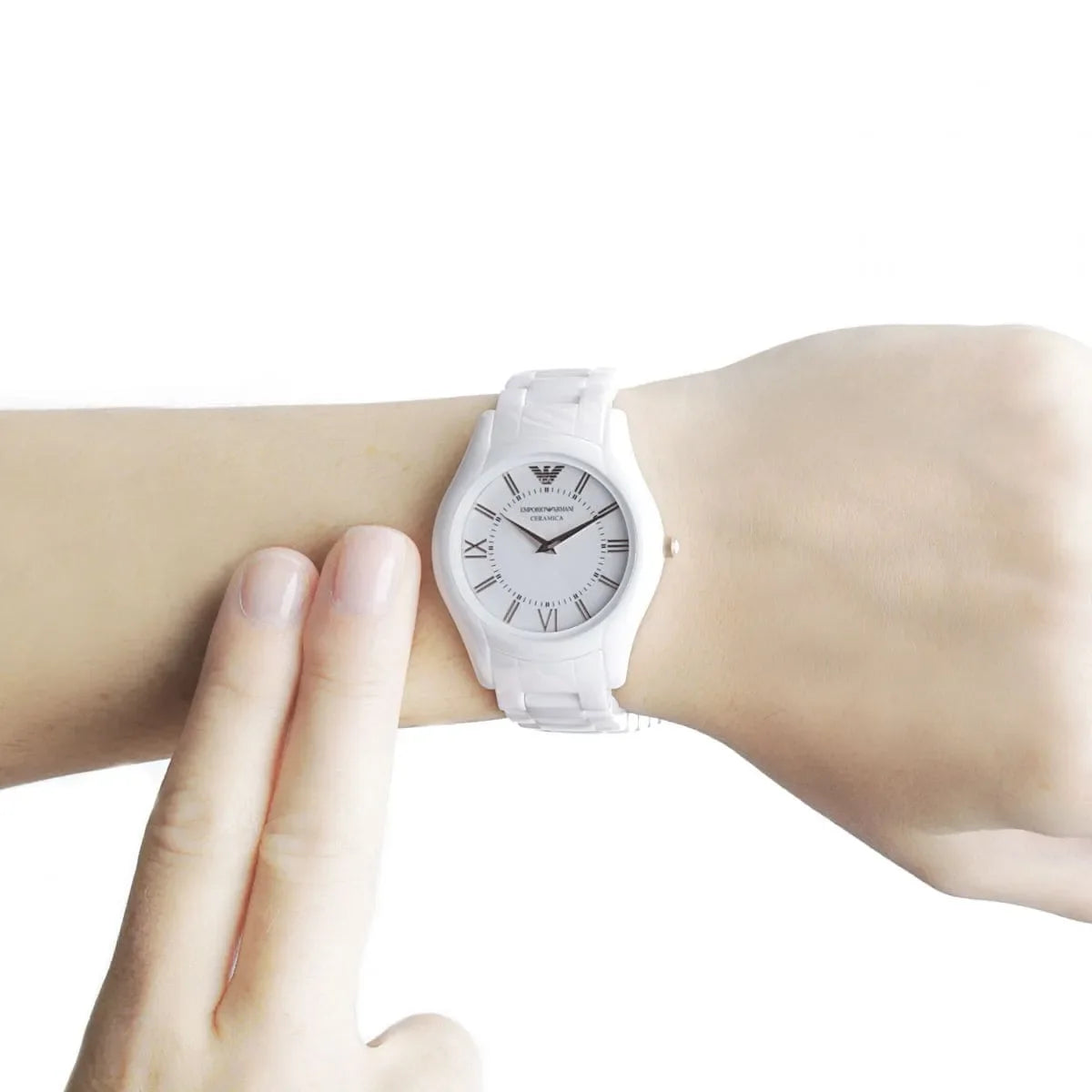 Emporio Armani Ceramica white women's watch worn on wrist showing dial and ceramic strap