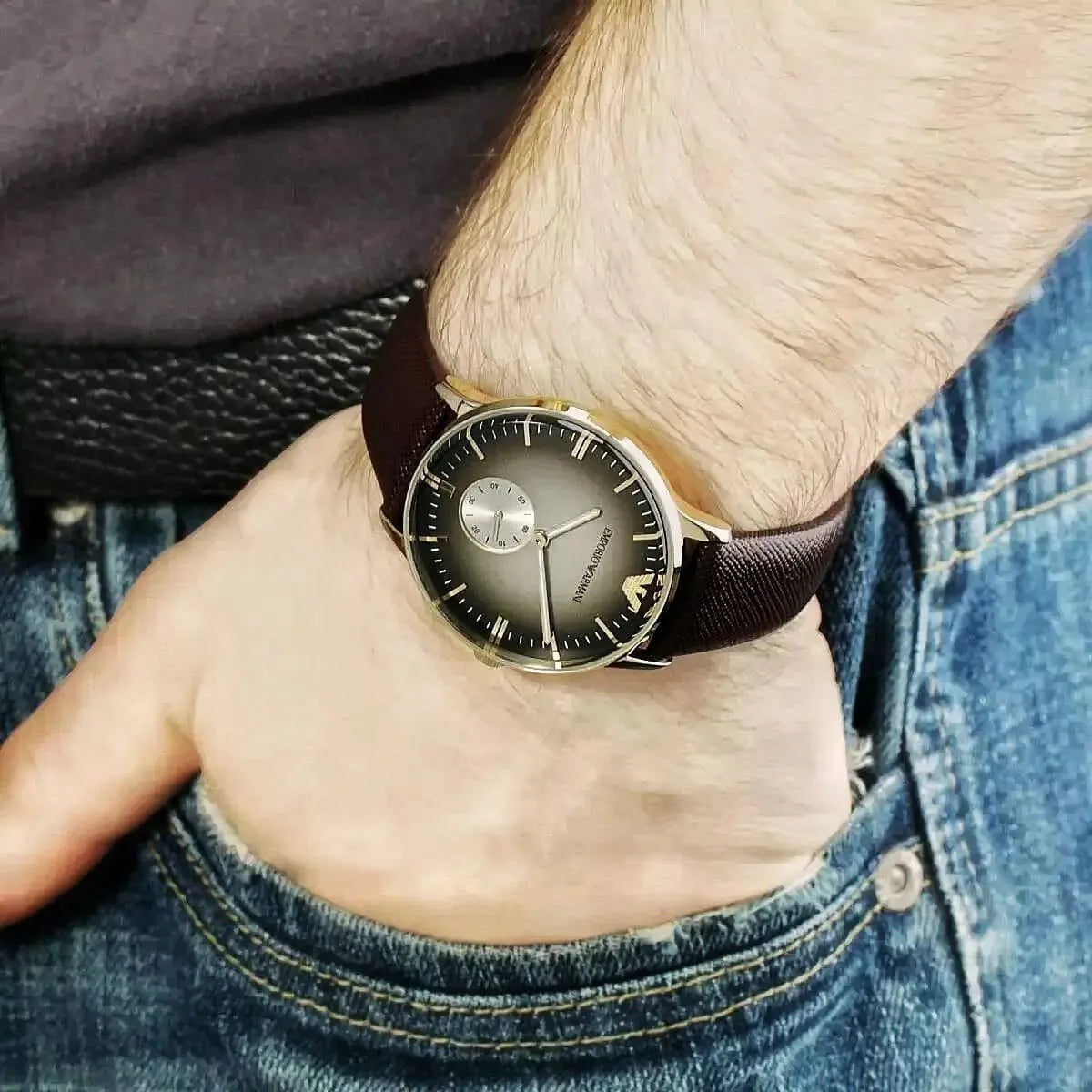 Emporio Armani Alpha Medium watch on wrist with denim styled wear