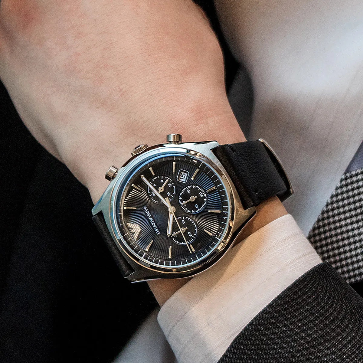 Emporio Armani AR1975 worn on wrist showing black dial chronograph and leather strap