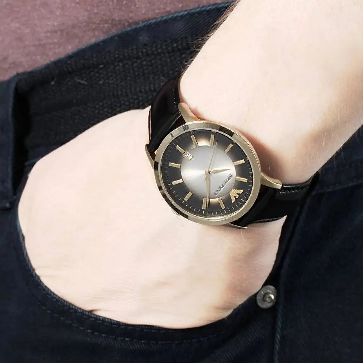 Emporio Armani AR2468 watch on wrist with silver dial and black leather band