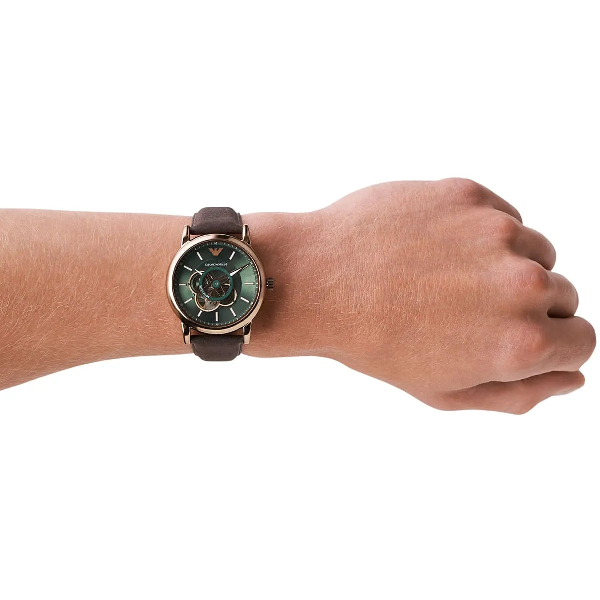 Emporio Armani AR60033 worn on wrist with green dial and skeleton mechanism visible