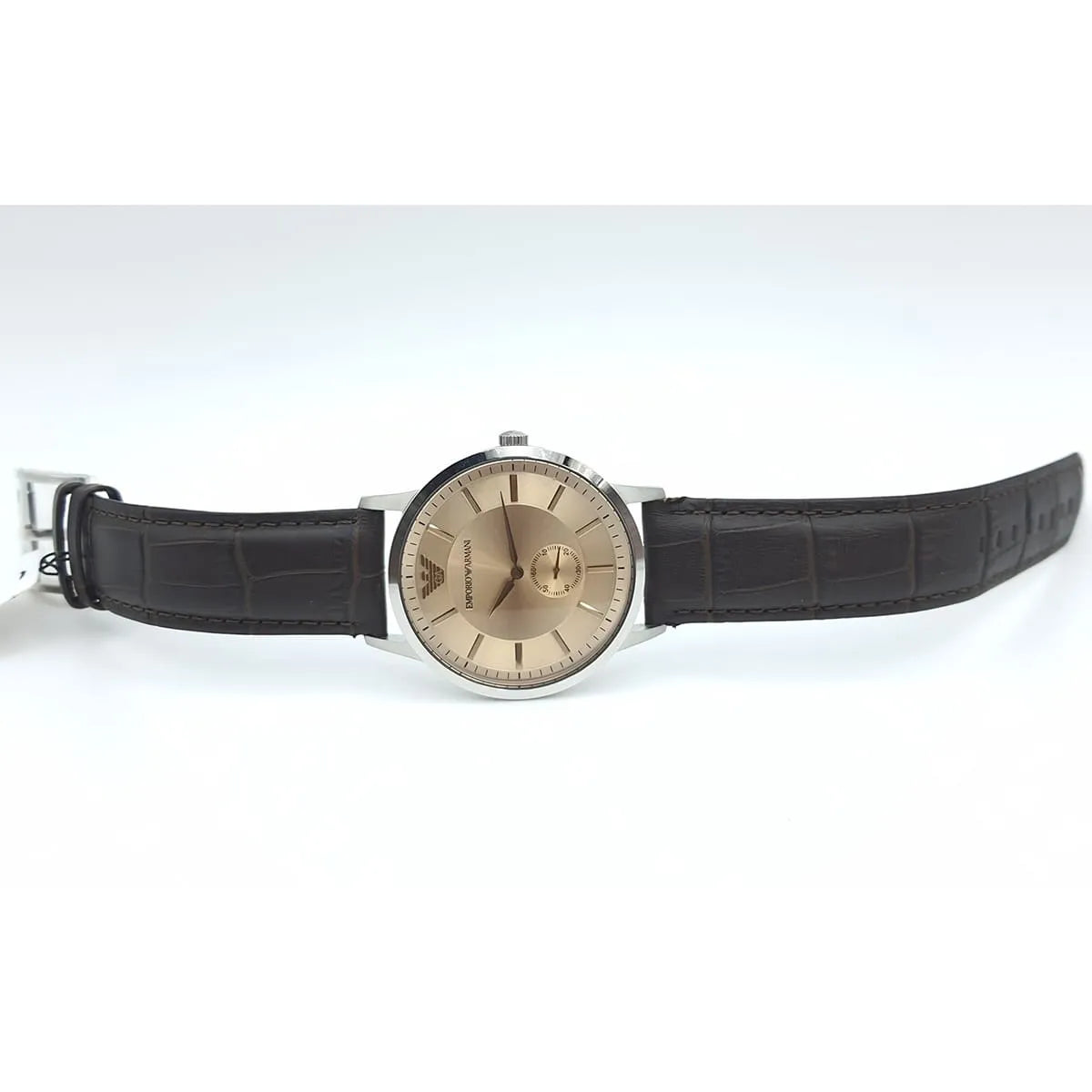 Emporio Armani Kappa AR9106M displayed on brown leather strap showing full watch profile and clasp