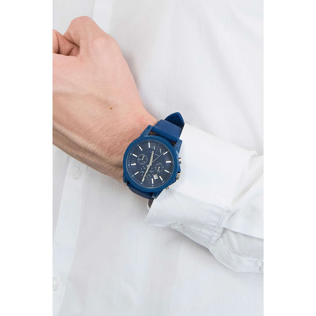 Armani Exchange AX1327 blue multifunction watch worn on wrist with white shirt