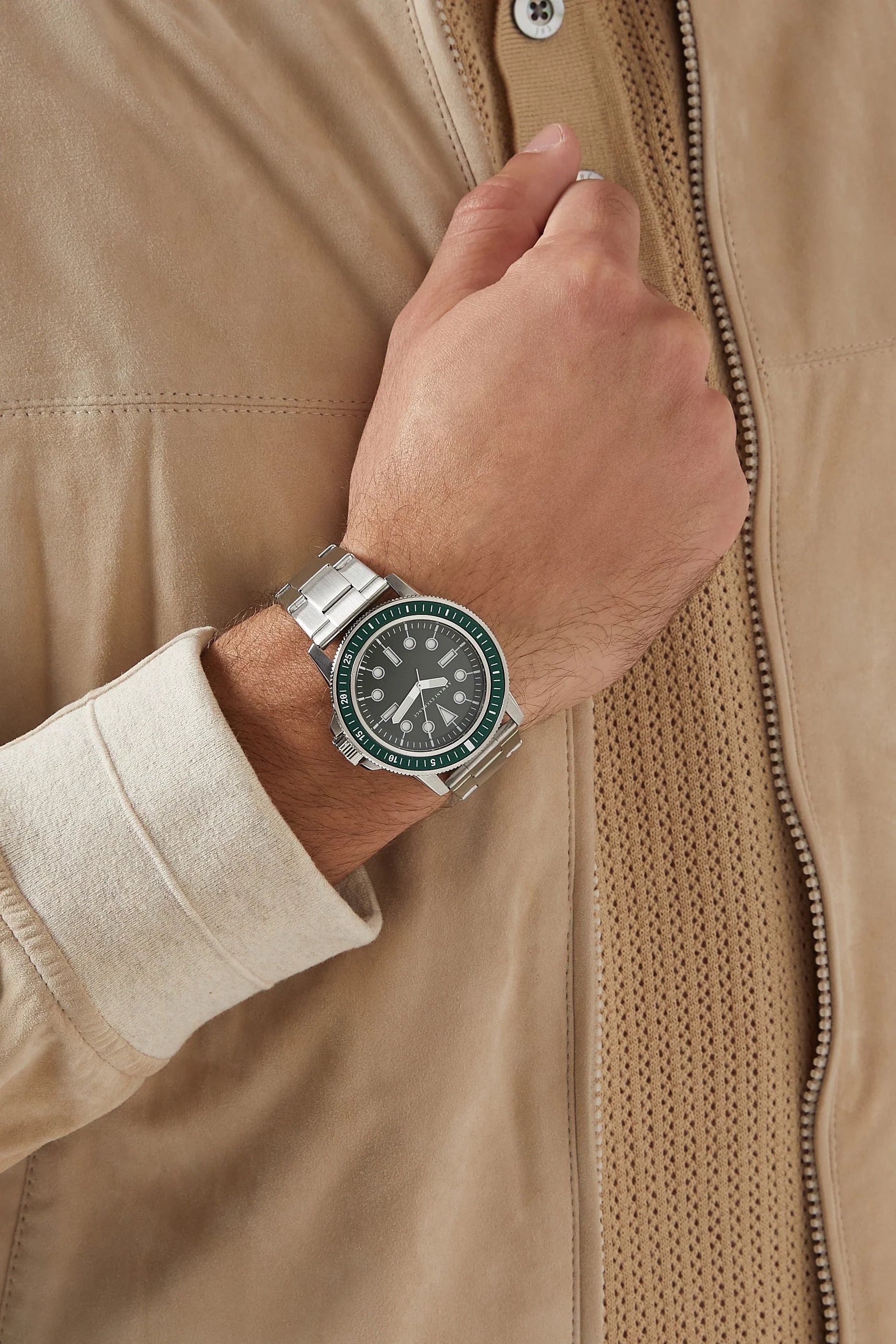 Armani Exchange Leonardo AX1860 watch worn on wrist with tan jacket
