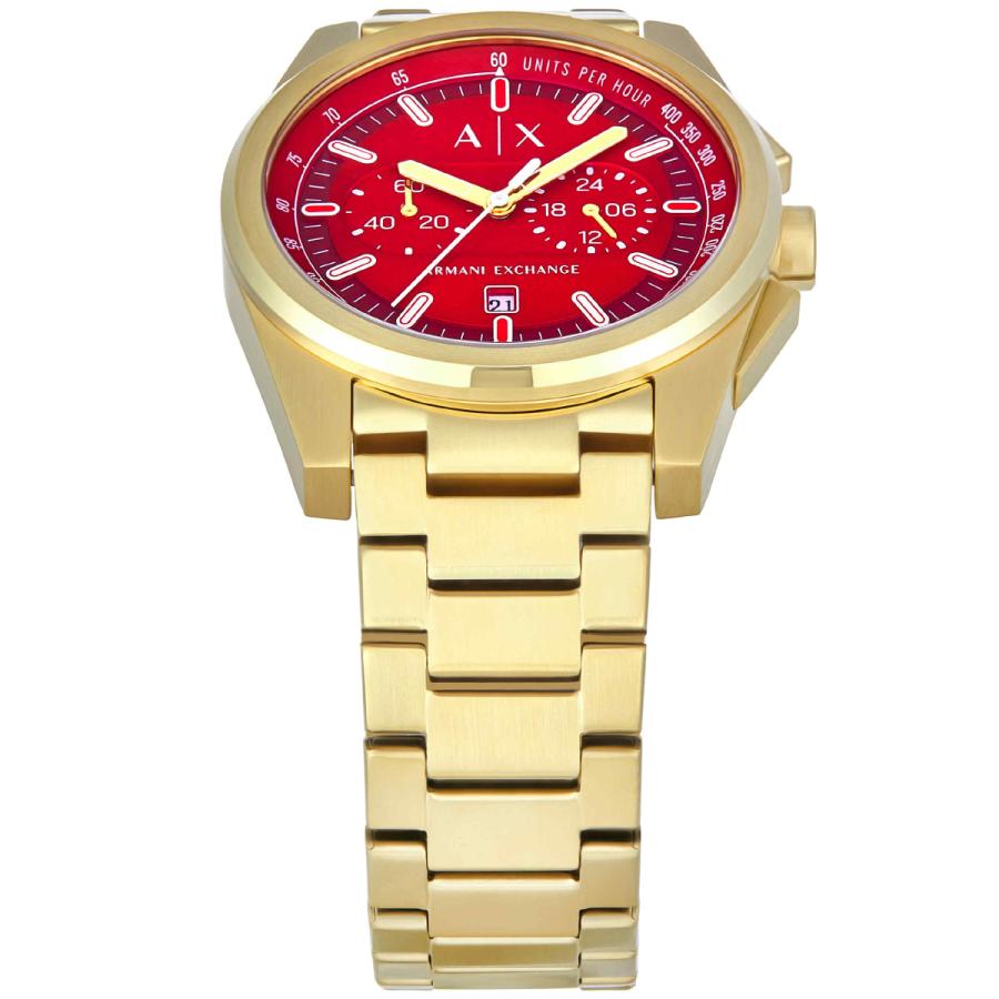 Close-up of red dial with chronograph subdials, gold hands and hour markers