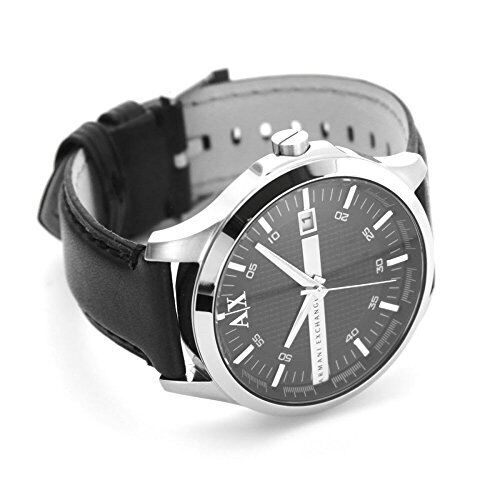 Armani Exchange Whitman watch on wrist displaying black dial and silver-tone case