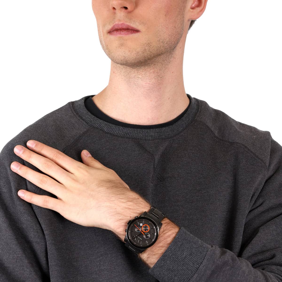 Armani Exchange AX2514 gunmetal watch on wrist with dark crew neck shirt