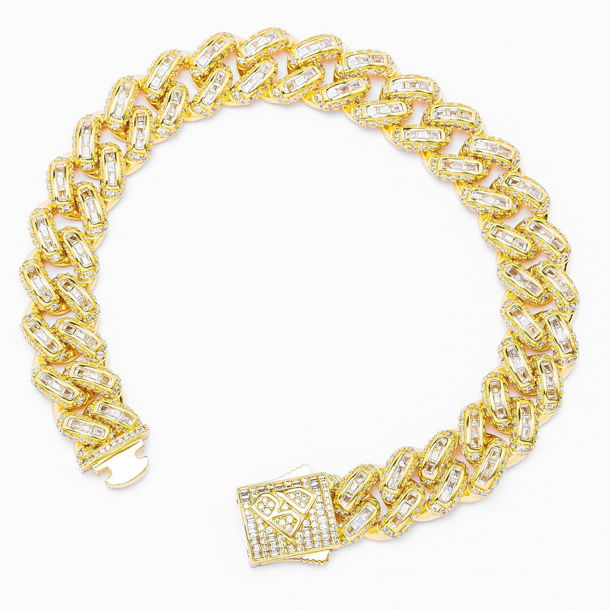Gold Cuban link bracelet showing 12MM links and diamond-cut iced-out clasp
