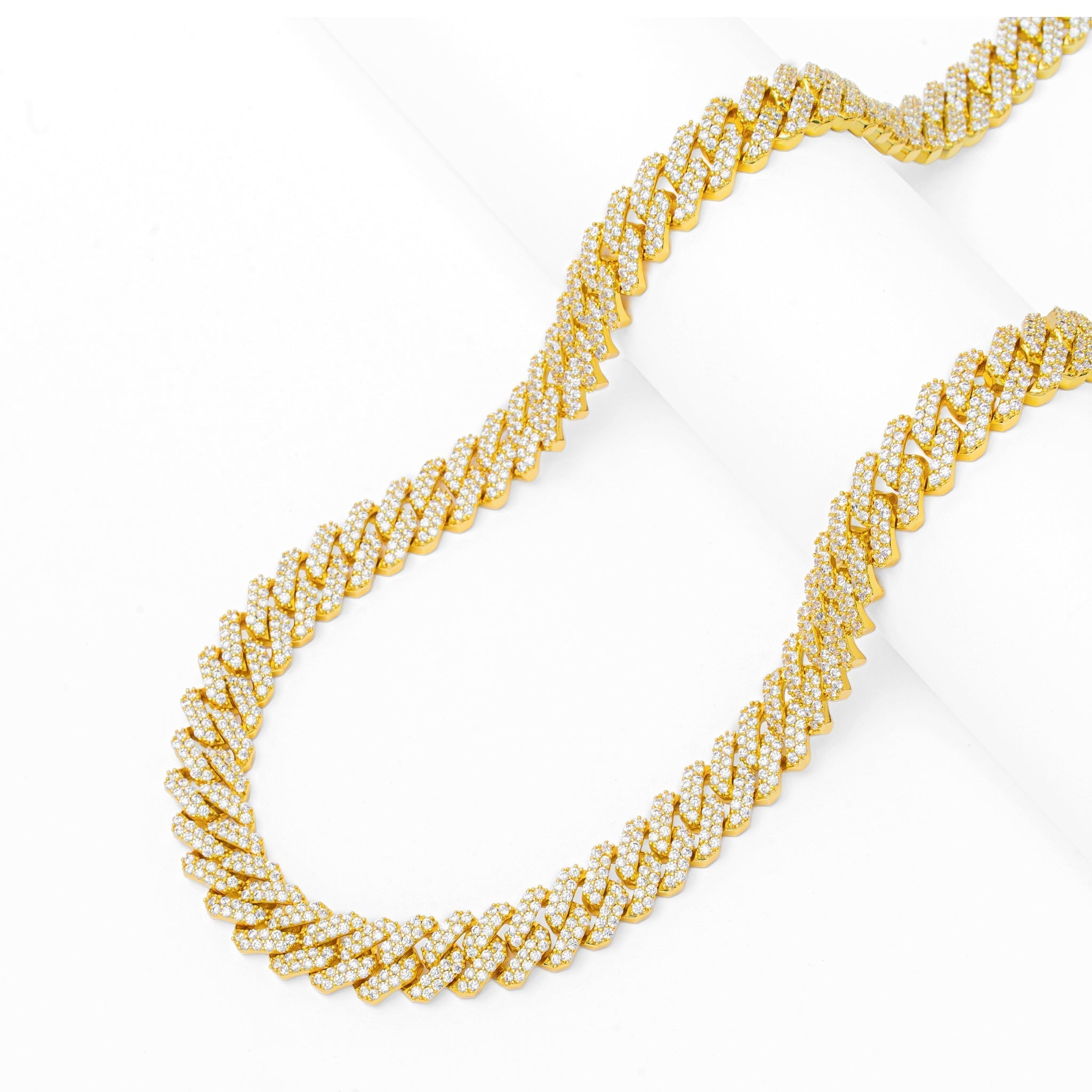 12MM Big Daddy Cuban gold chain laid flat showing full length and iced out design