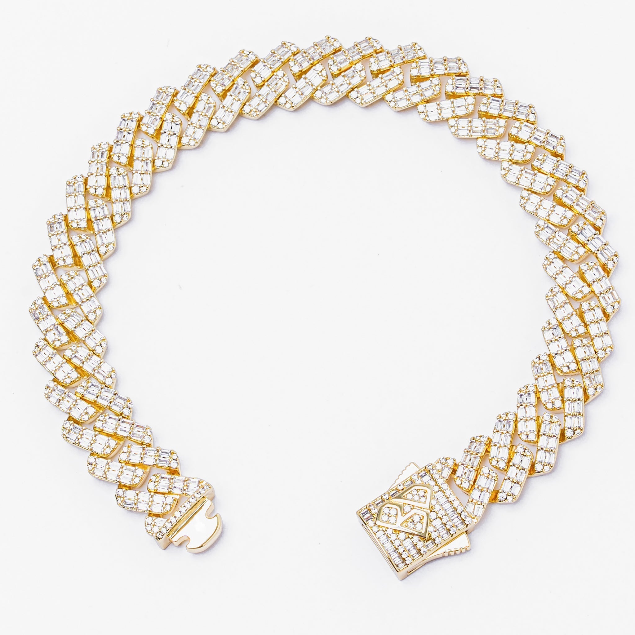 Big Daddy 12MM gold Cuban bracelet angle view showing diamond baguette inlay and clasp