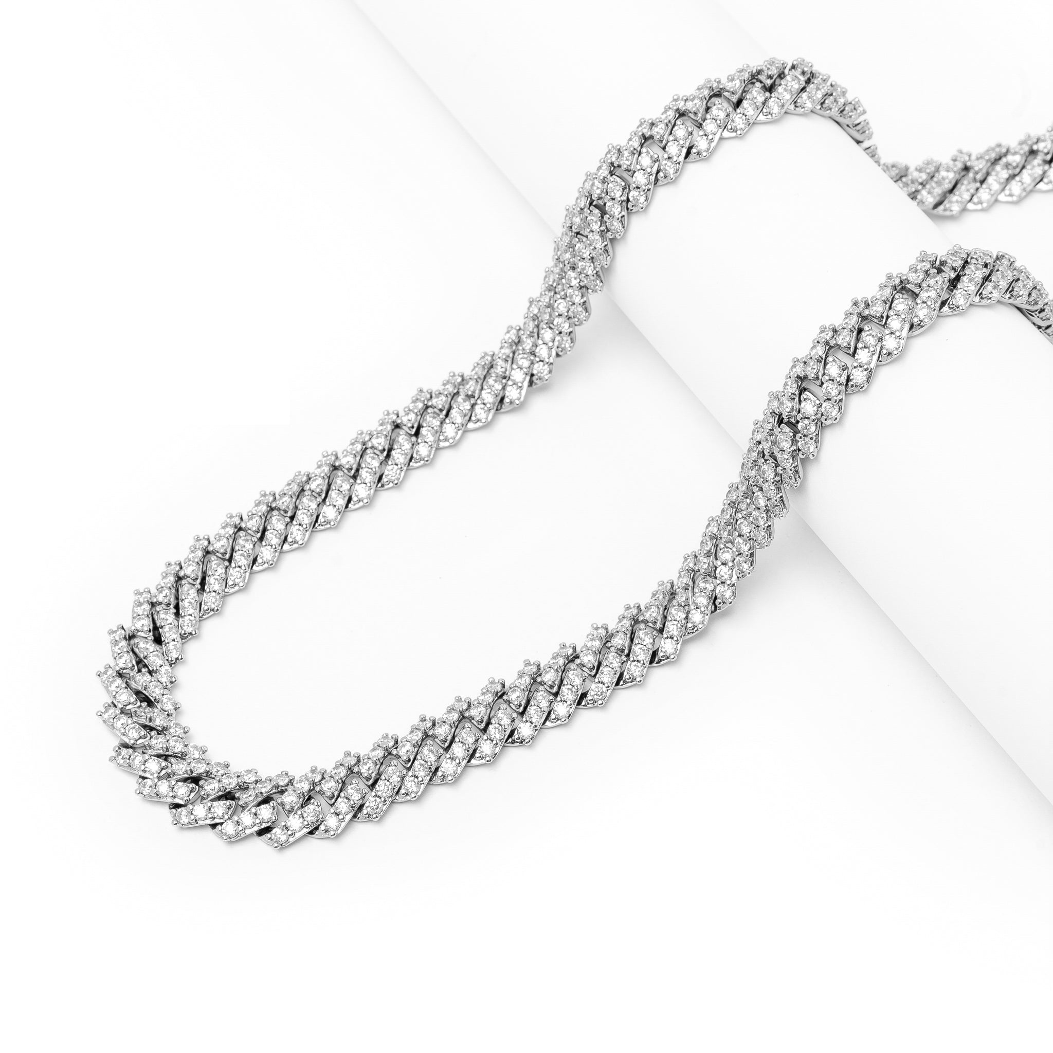 Side view of Big Daddy 12MM silver Cuban chain showing link construction and stone detail