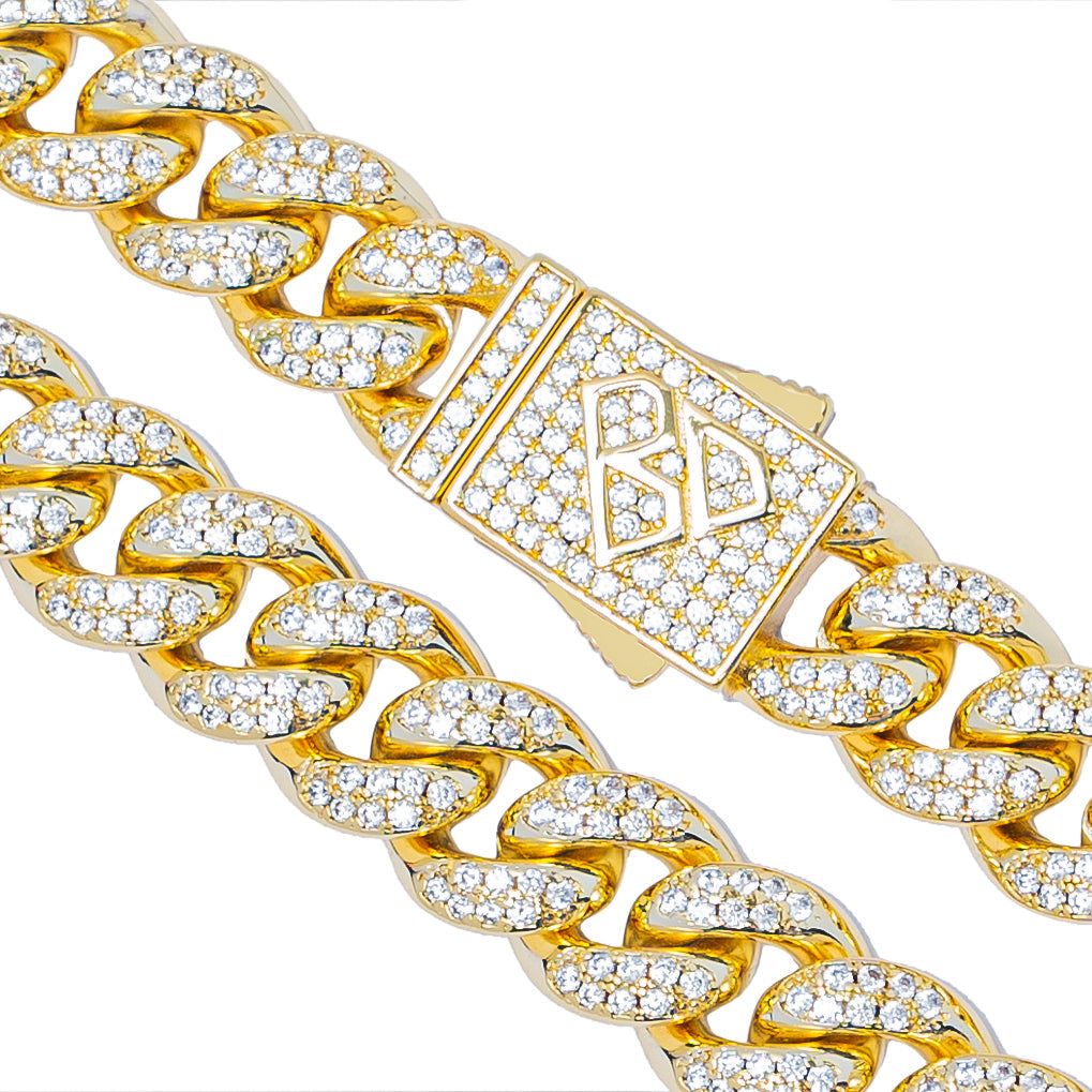 Close-up of crystal-encrusted cuban links and branded box clasp