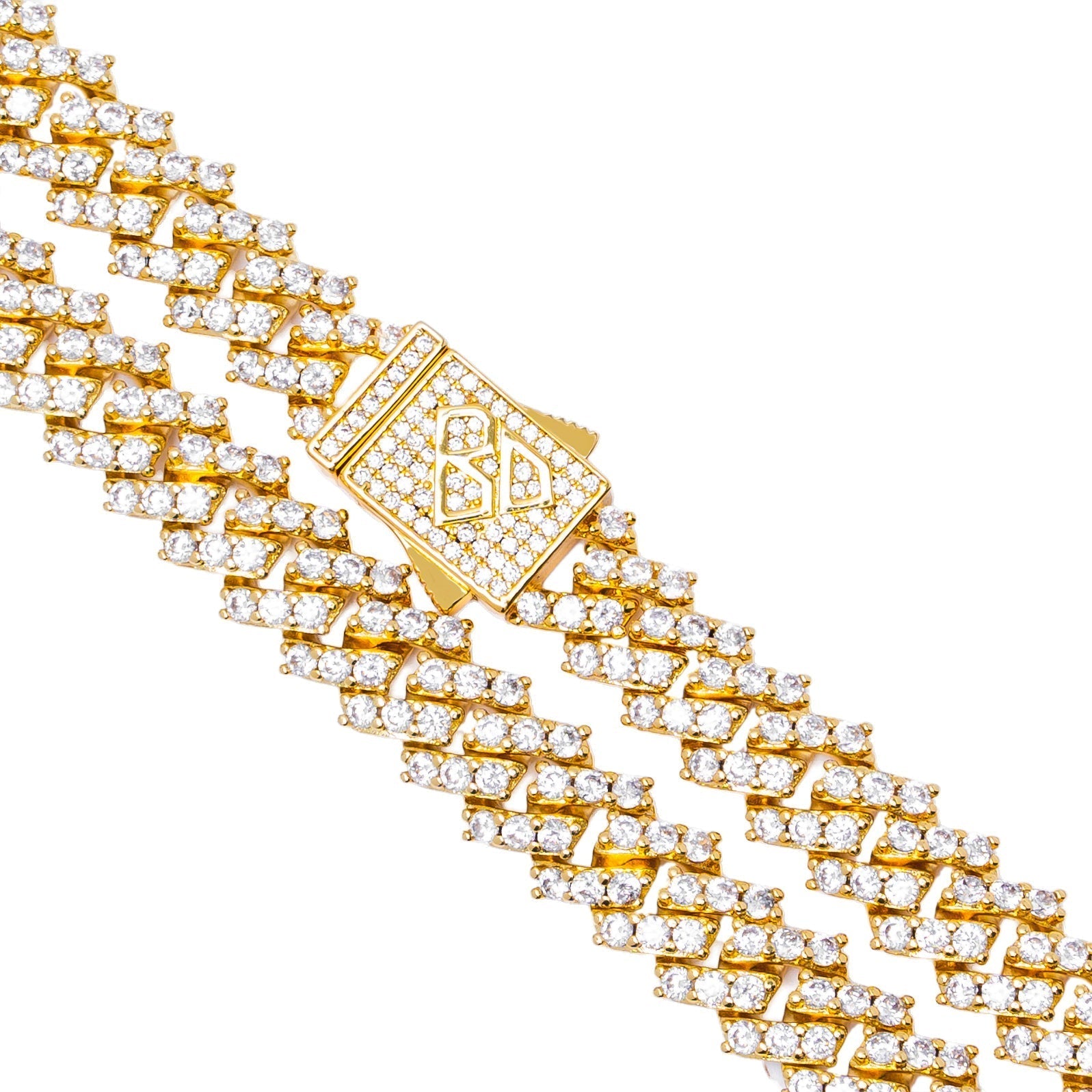 Gold Cuban link chain with diamond prongs and ornamental clasp detail