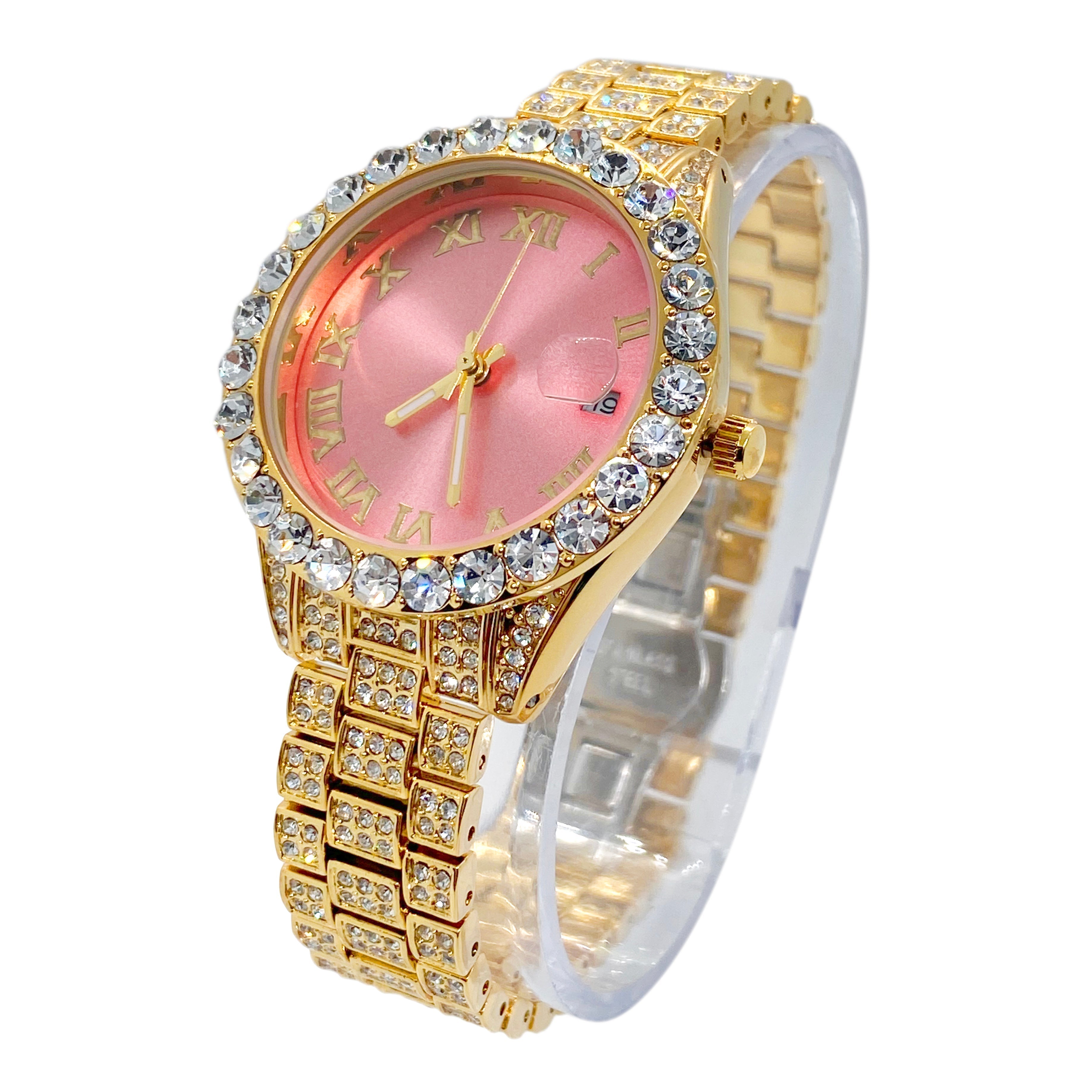 Side view of gold watch with pink dial and crystal-set bracelet strap
