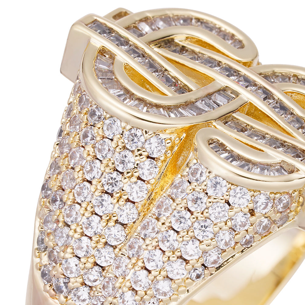Close-up detail of dollar sign top with baguette crystals and round stone settings