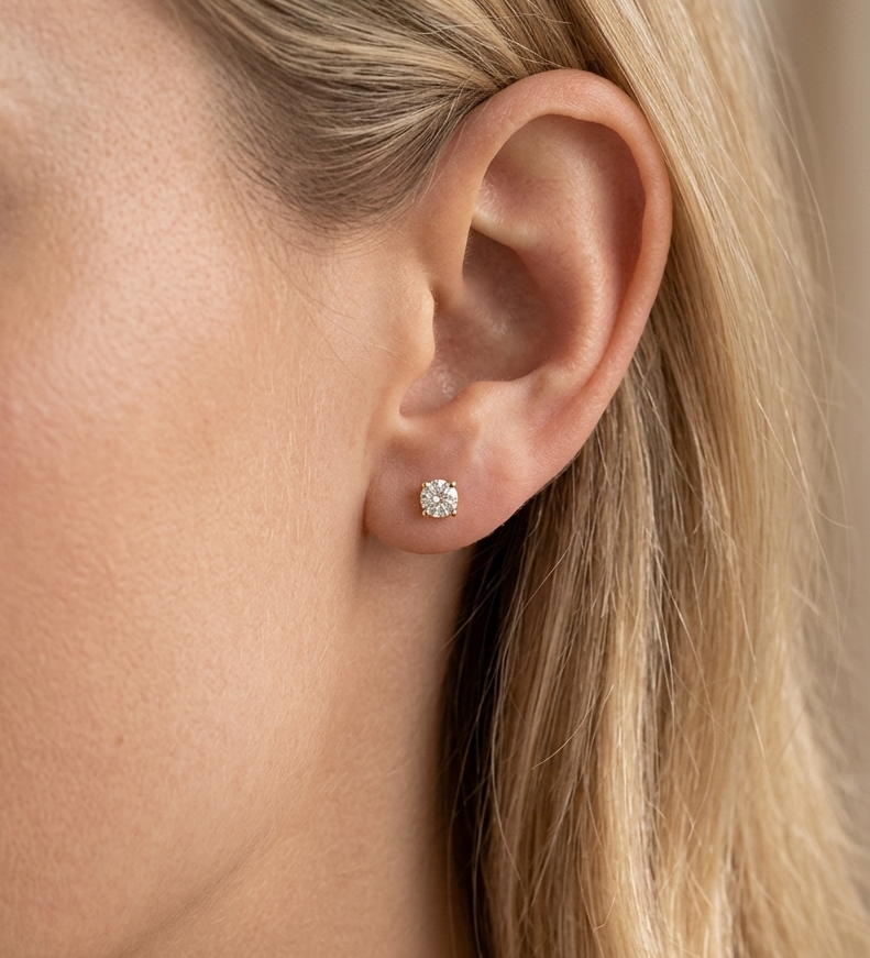 Big Daddy Solitaire diamond earring worn on ear, showing how the stud appears when worn