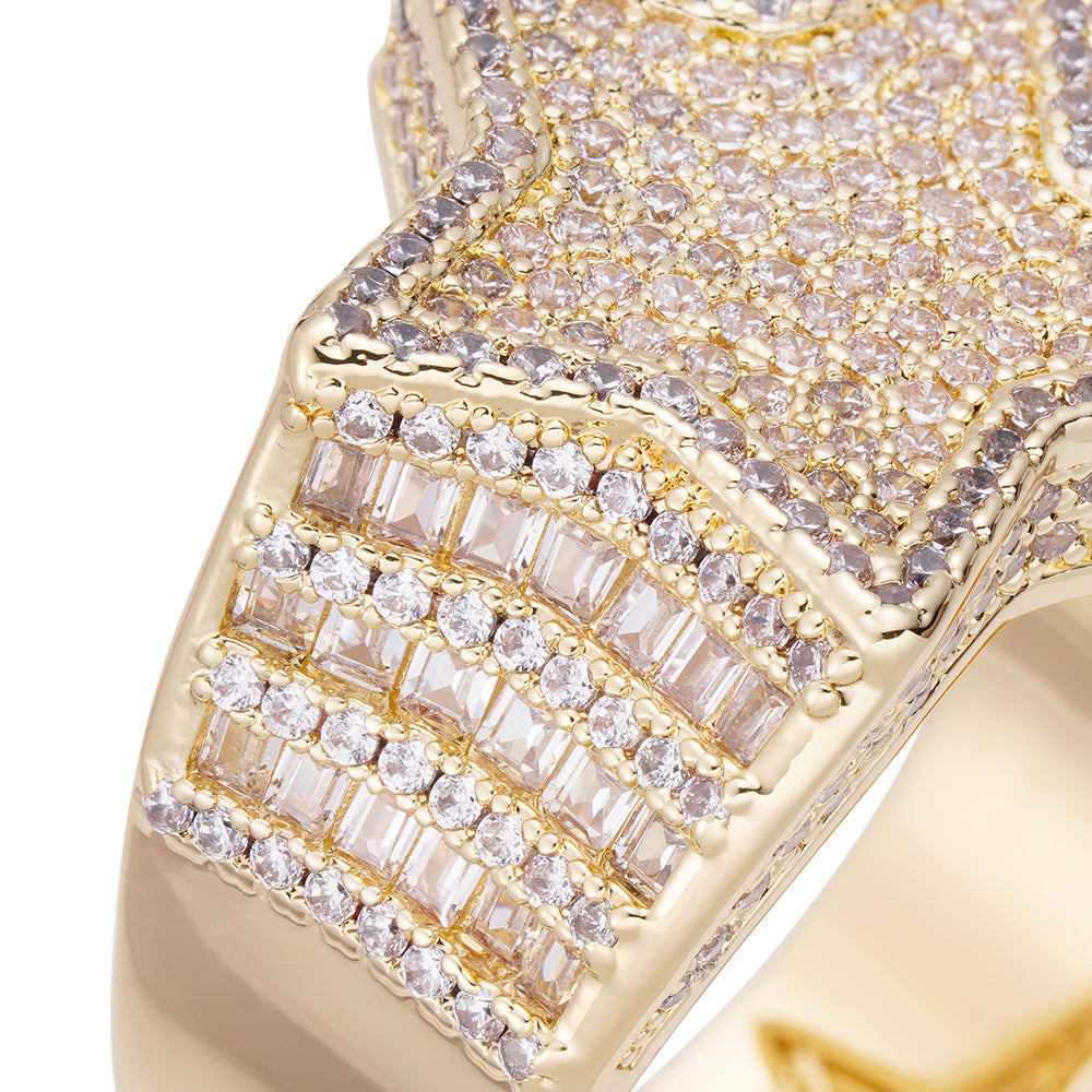 Close-up of baguette crystal rows and iced out diamond details on the ring