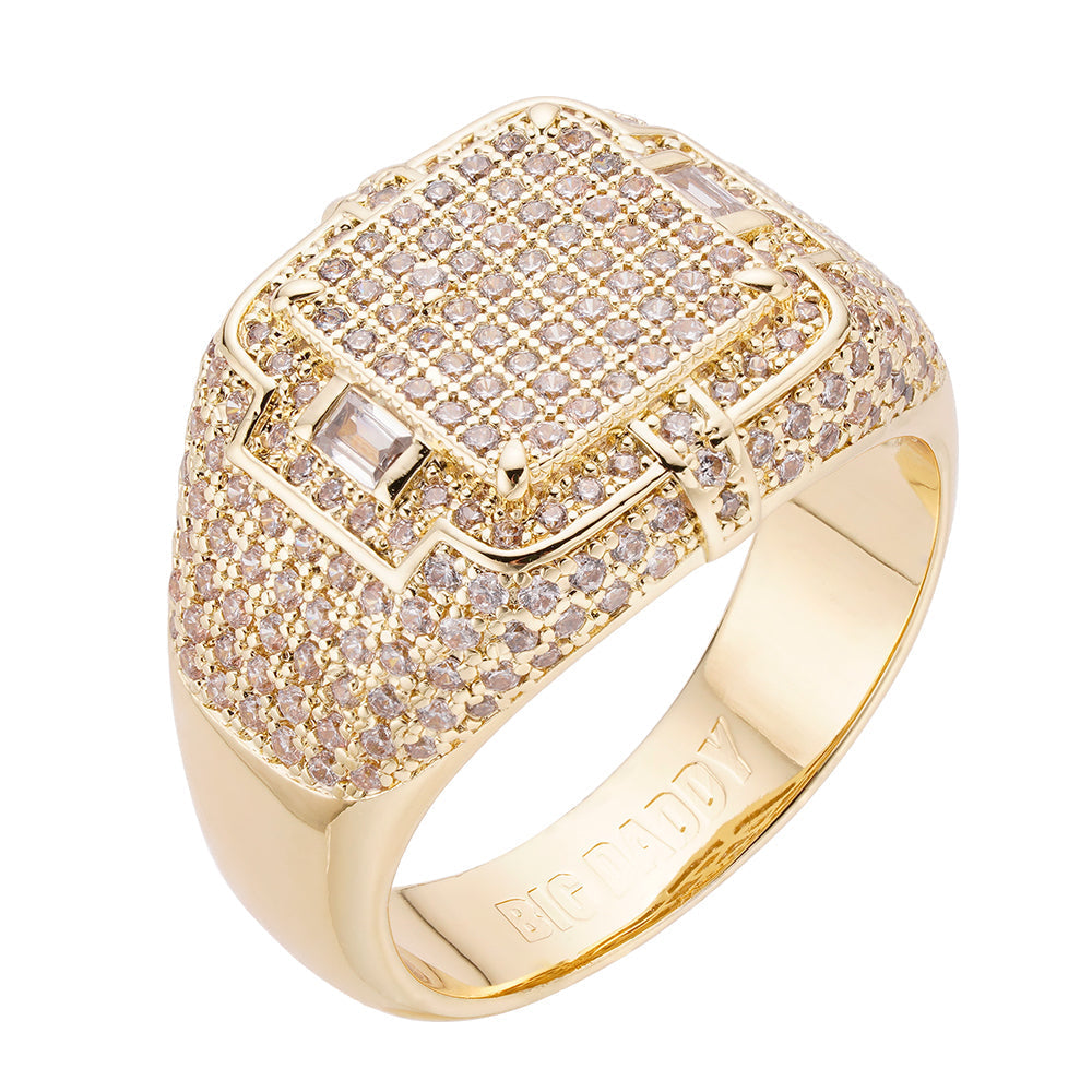 Gold iced out ring with full diamond cluster and square center stone, front view