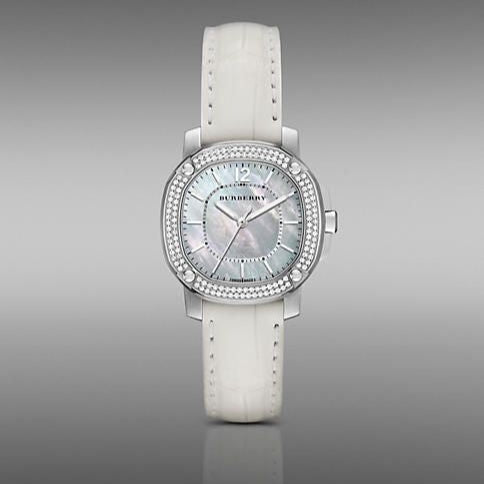 Burberry Britain BBY1800 watch on wrist with white leather strap and diamond bezel