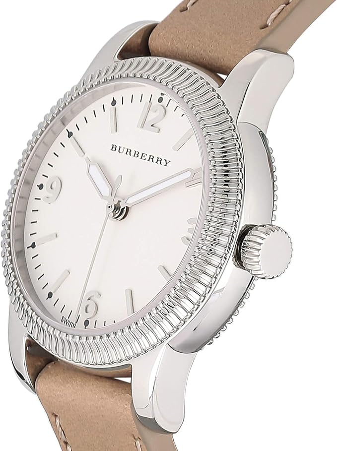 Burberry BU7847 watch angled view showing white dial, silver case, and beige strap